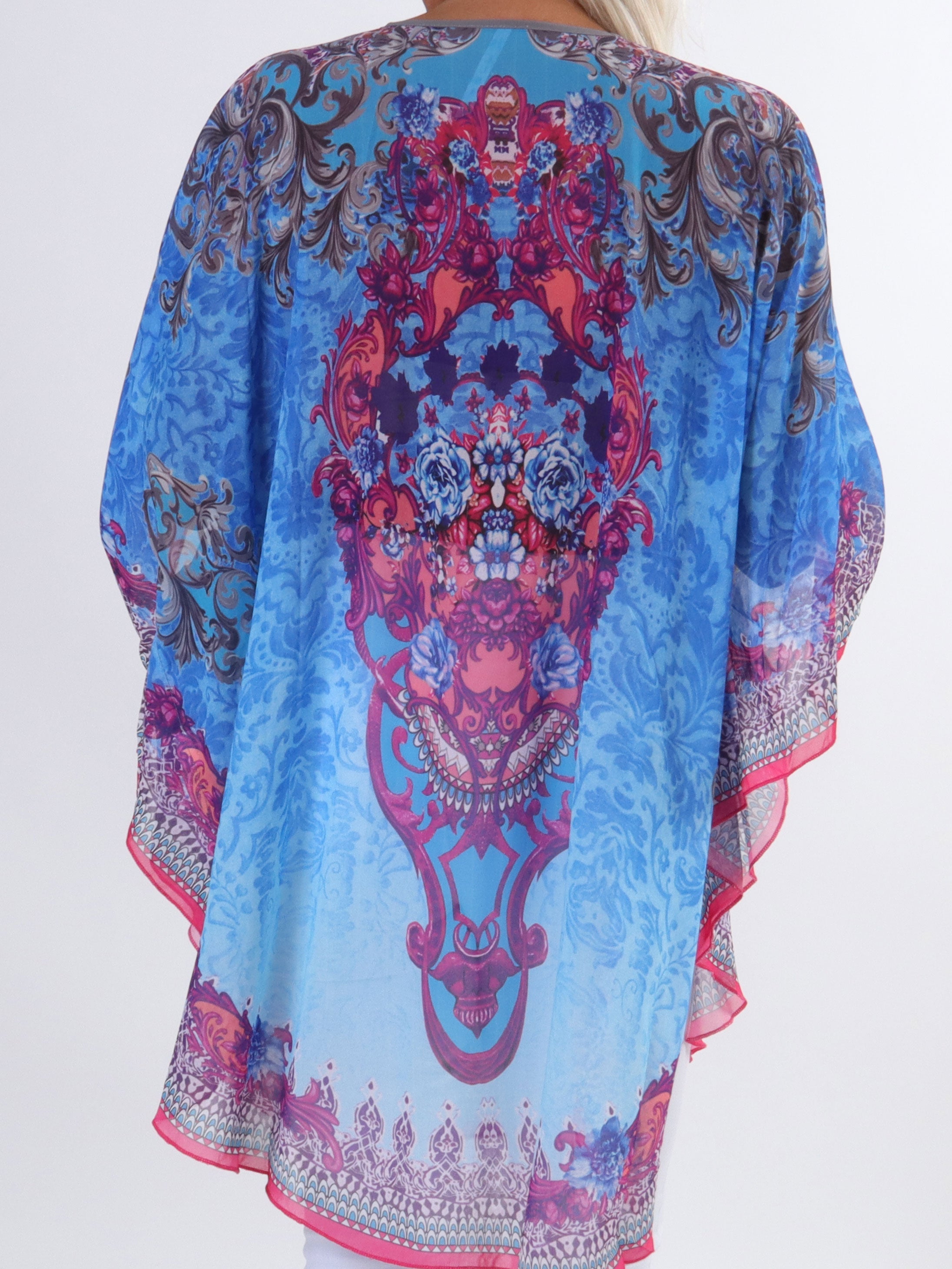 Sigga - Halvtransparent tunika med fuskpälskant i plusstorlek